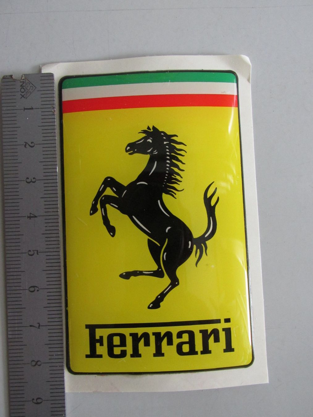 Ferrari Tutti i ricambio: FERRARI Emblem bombiert 52x83 – Nuovo e nell'imballaggio originale da Läufelfingen venduto da ferrari1948