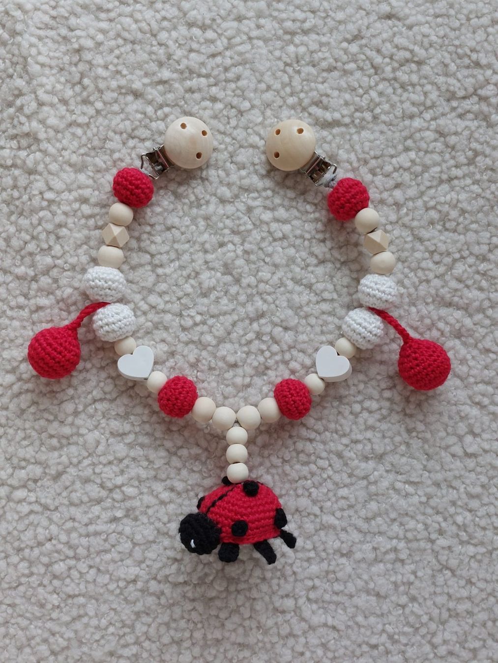 Jouets: Kinderwagenkette Marienkäfer – Neuf avec emballage d'origine à Bleienbach par babyhandgemachts