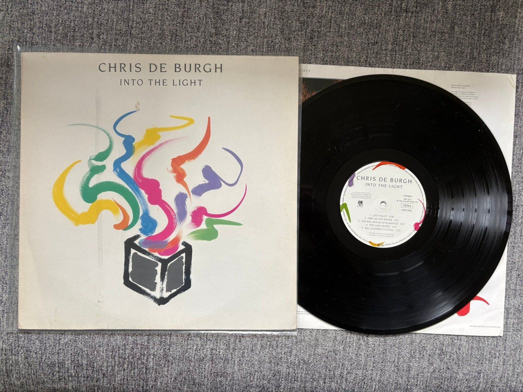 Dischi in vinile: De Burgh, Chris - Into The Light - DE - 1986 - A&M Records – Usato da Zofingen venduto da Bigron