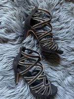Elegante, schwarze Sandalen mit goldenen Details, Grösse 36