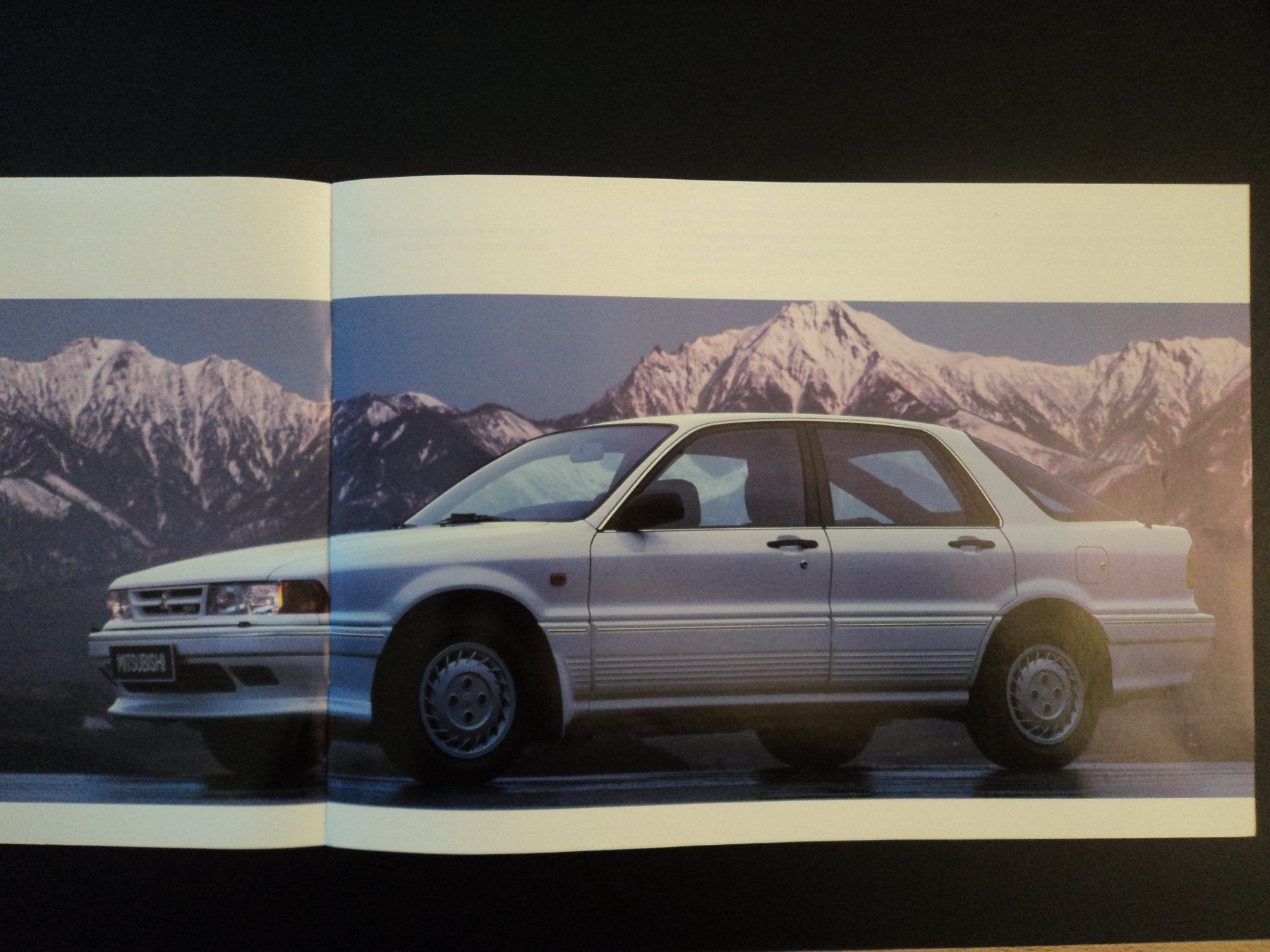 Mitsubishi Documenti: Prospekt Mitsubishi Galant Hatchback 4x4  1989 – Usato da Schwarzenburg venduto da modelCARama 1