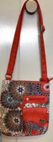 Sac à bandoulière couleur  corail motif floral état neuf