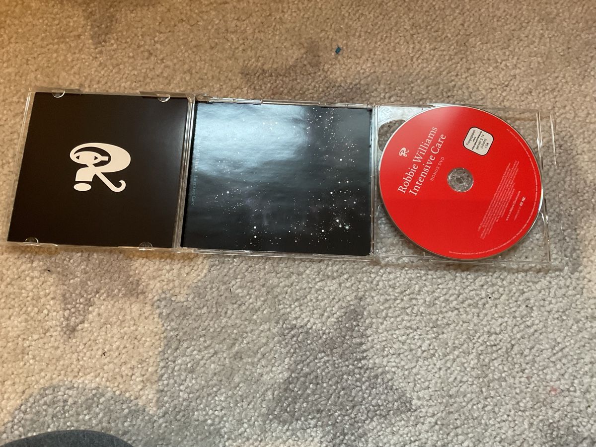 CD: Robbie Williams - Intensive Care CD + Bonus DVD – Usato da Grub SG venduto da Vinciguerra 3