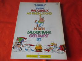 Comic Asterix, wie Obelix in den Zaubertrank geplumst ist