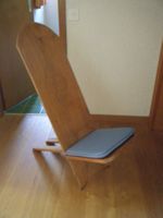 chaise africaine sculptée en bois exotique massif