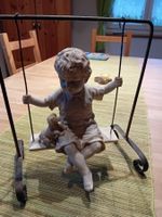 Engel auf Schaukel