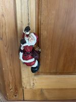 Kletternder Weihnachtsmann 26 cm hoch