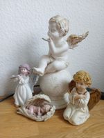 Angel Figurines - Set of 4 -  wing of large angel broken