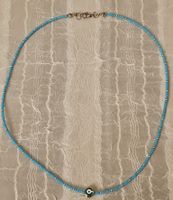 Blaue Perlenkette mit Nazar-Amulett