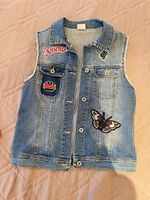 gilet jeans con applicazioni