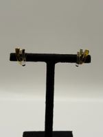 Boucles d’oreilles en or jaune et blanc serties de diamants