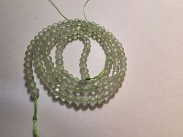 Prehnit facettiert 3mm. Strang Strang