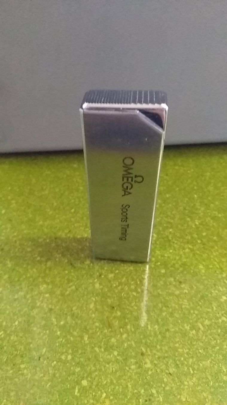 Omega Feuerzeuge: Omega sport timing Feuerzeug – Defekt aus Biel/Bienne von ruggi03