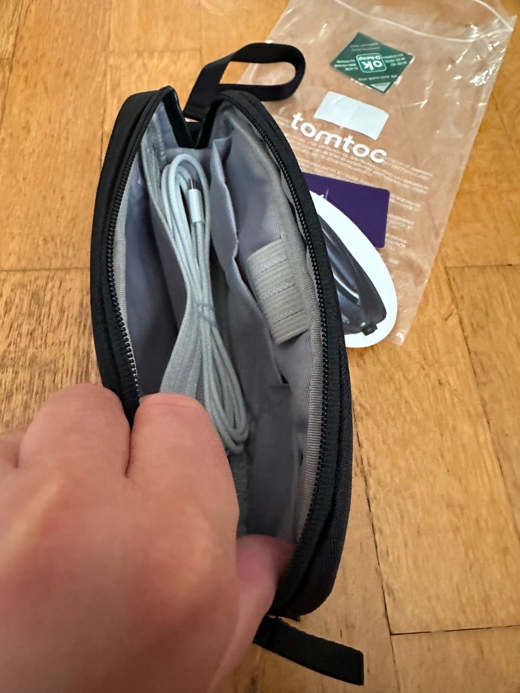 Taschen: tomtoc Light-T12 schwarz neu – Neu und originalverpackt aus Bern von womiman 1