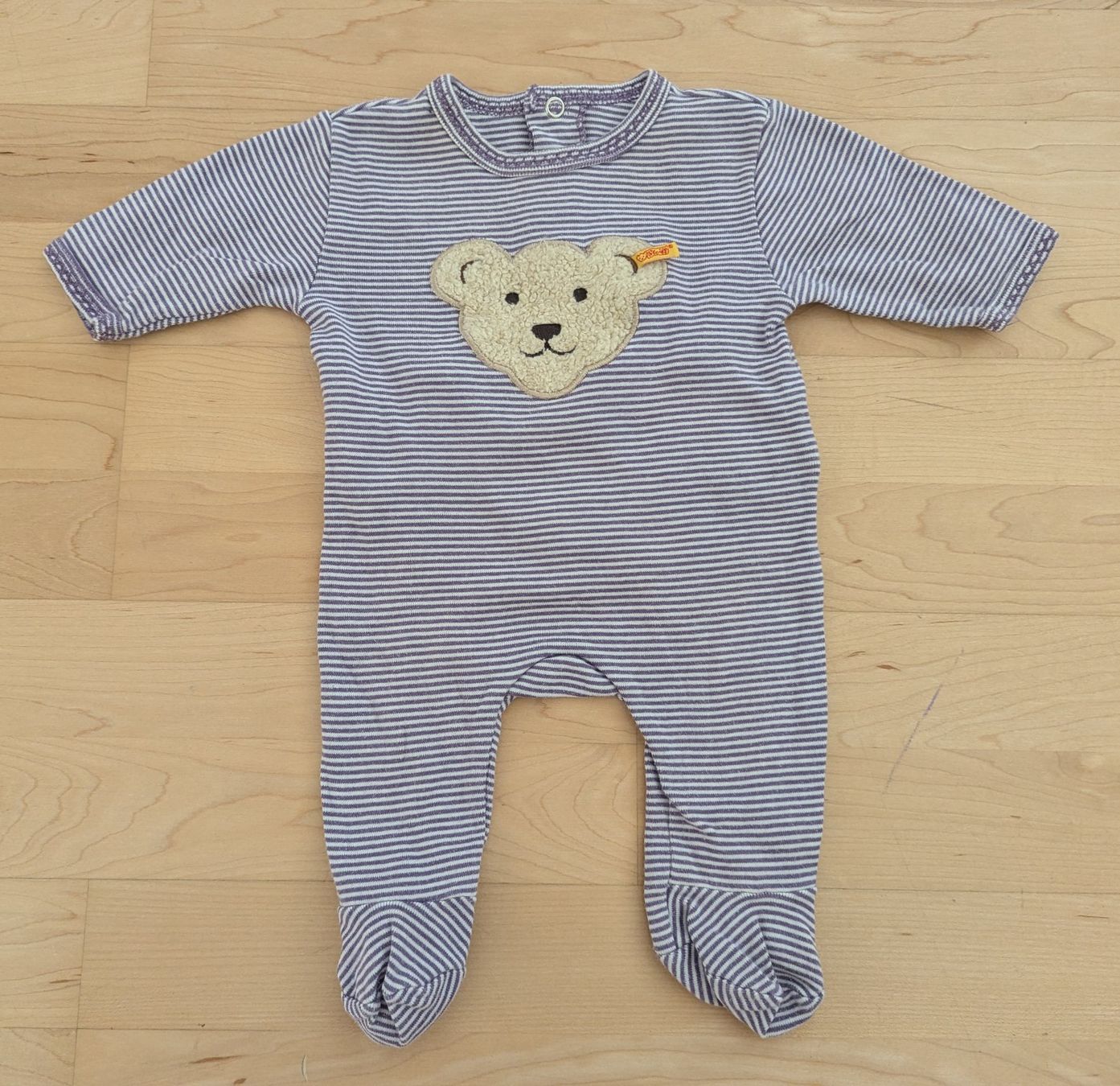 Pagliaccetti: Baby Strampler Grösse 50 Steiff gestreift mit Teddy – Usato da Uster venduto da petches
