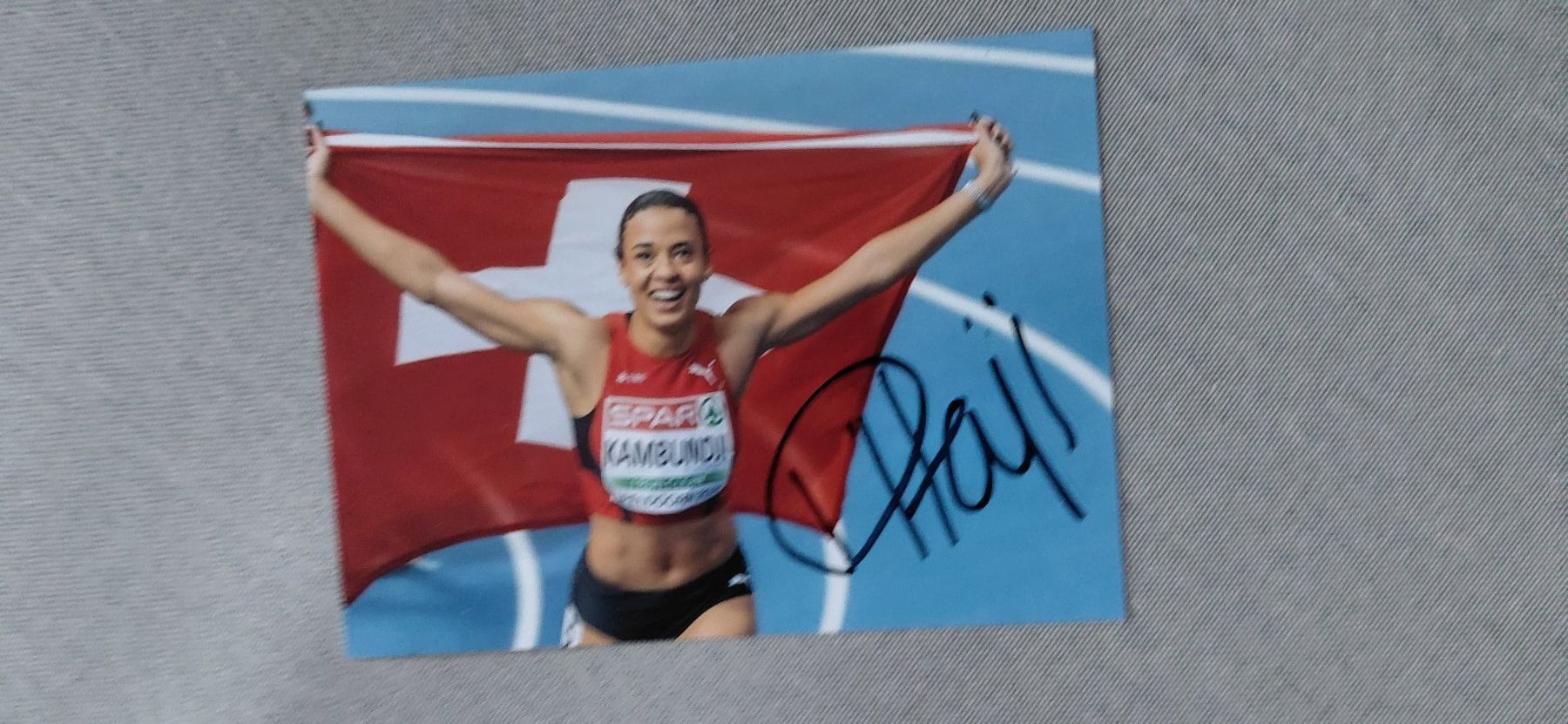 Autografi: Autogramm Ditaji  Kambundji – Usato da Schmerikon venduto da Olympia04