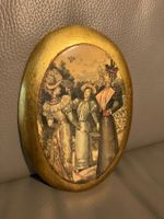 Decorazione ovale da appendere in coccio con damine