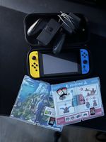 Nintendo Switch + 4 Games und Zubehör - Top Zustand!