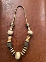 1 collier fantaisie selon photo
