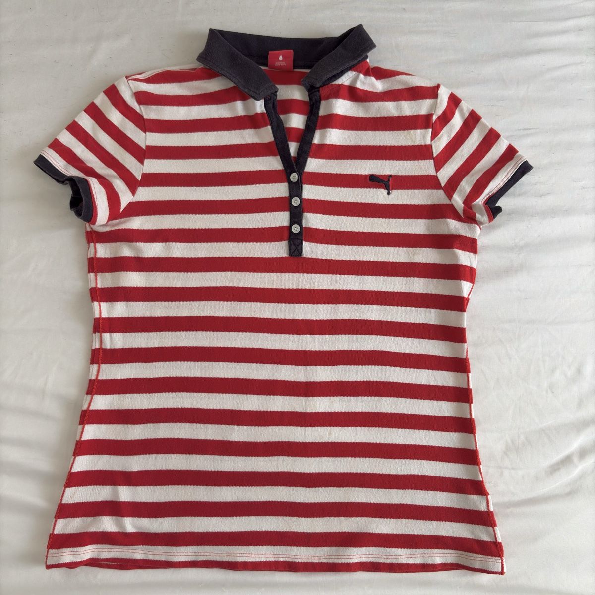 Puma Magliette Polo: Polo rayé rouge et blanc Puma – Usato da Moudon venduto da TigerrrEye