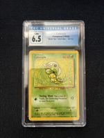 Carta Pokémon Caterpie Base Set 1999 CGC 6.5 slab
