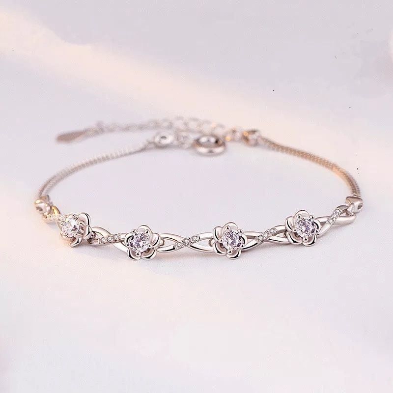 Bracciali & Braccialetti: silber armkette mit blumen – Nuovo e nell'imballaggio originale da St. Gallen venduto da yatoot26