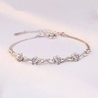 silber armkette mit blumen