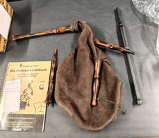 Dudelsack mit Lehrbuch