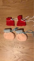 Süsse, handgestrickte Baby Finken für den Winter