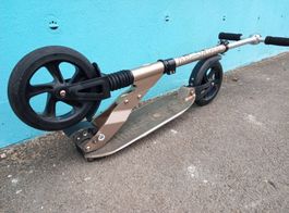 Trottinette grande roue pliable