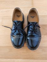Dr. Martens chaussures basses en cuir vernis