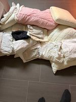 Assortment of bedding and towels