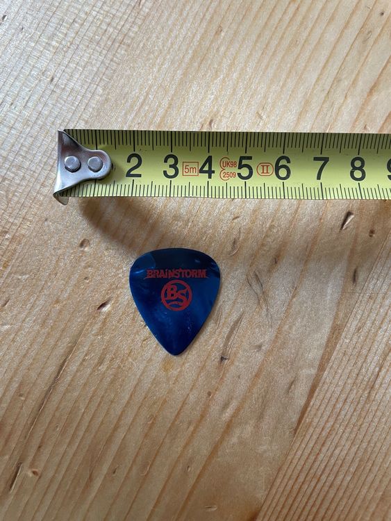 Produktbild von Graviertes Edelstahl-Gitarrenplektrum – Einzigartiges