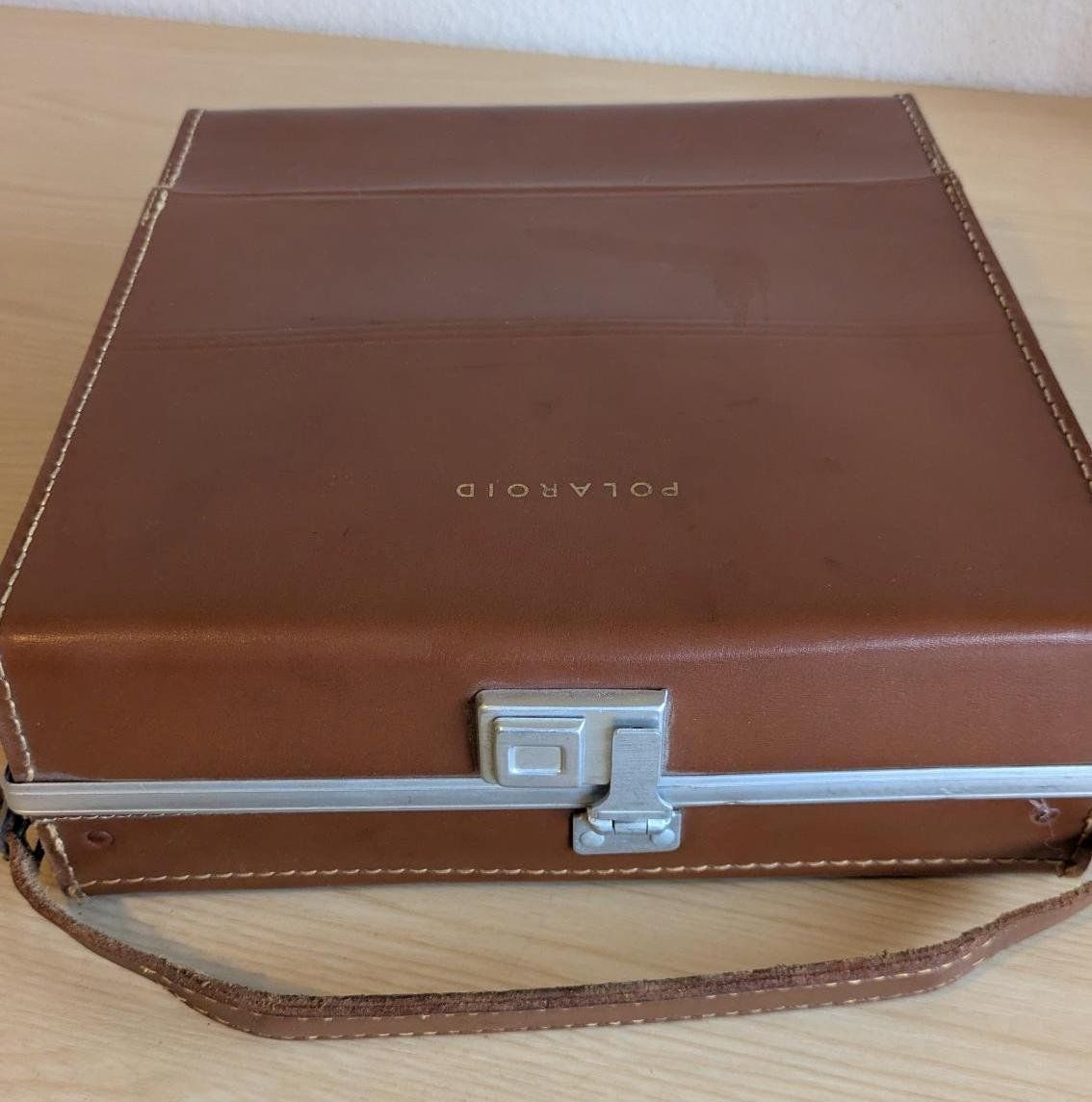 Polaroid Fotocamera: Polaroid j66 Adapter for Type 48 mit Ledertasche – Usato da Kastanienbaum venduto da therebellsmurfette 2