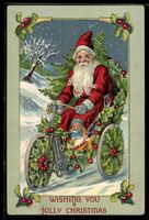 Weihnachtsmann fährt auf Fahrrad mit St