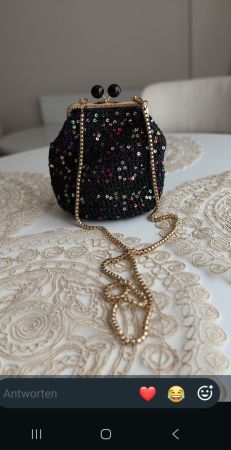 Kleine Handtasche schwarz mit Pailletten gebraucht