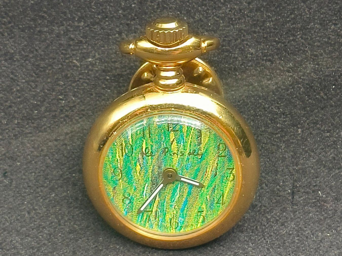 Orologi: Pin's Oly – Usato da La Chaux-de-Fonds venduto da curtitswisswatches