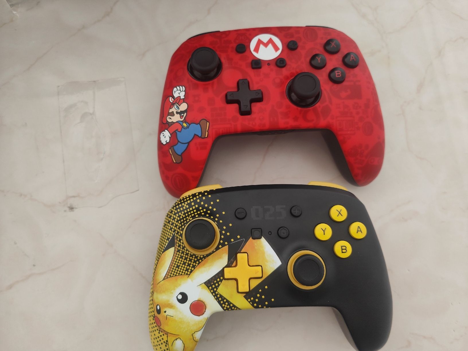 Nintendo Controller: Nintendo Switch Pro Controller Pikachu und Mario edition. – Neu (gemäss Beschreibung) aus Arbon von LucaItaliano