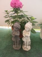 2 Gartenstatuen