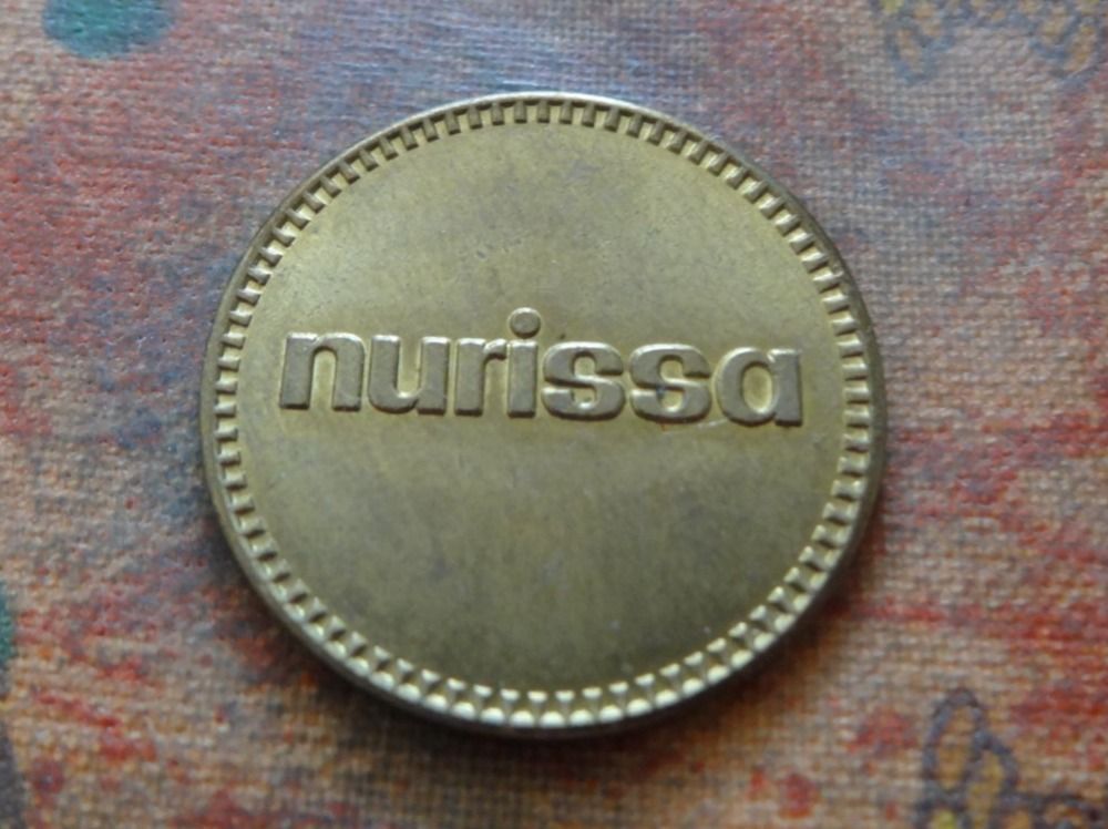 Tutti le monete: Jeton  "  NURISSA  "   (J) – Usato da Romanel-sur-Lausanne venduto da Swift13 1