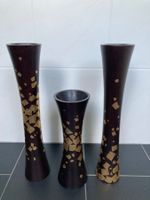 3 exclusive Vasen aus Holz mit Gold