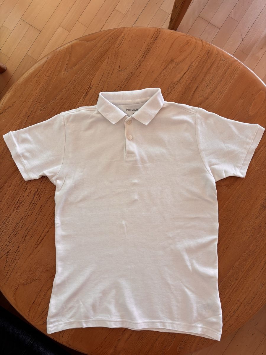 Primark Magliette Polo: Primark white polo shirt. – Usato da Zürich venduto da Grothschild 1