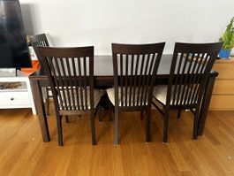 Dining table and 4 chairs dark wood used