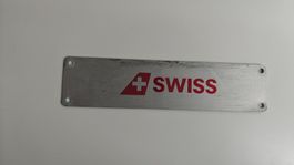 Swiss Plakette von Flugzeugtrolley