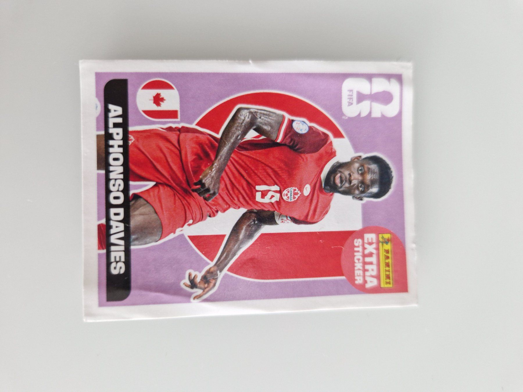 Panini Alben: Panini Extra Sticker Alphonso Davies FIFA WM 2026 – Gebraucht aus Gossau SG von Docla84