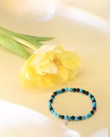 Armband aus Türkis und Onyx mit silbernem Sternanhänger