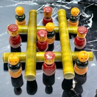 Jeu de morpion en bois fait à la main par Channapatna Toys