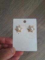 Elegante Ohrstecker mit Perlen und Zirkonia
