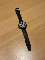 Montre Swatch Chronograph en cuir noir et beige