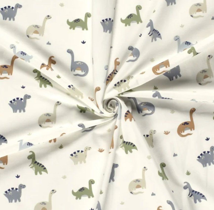 Tessuti: Baumwolljersey süsse Dinos cremeweiss – Nuovo e nell'imballaggio originale da Steg im Tösstal venduto da J.Kreisl